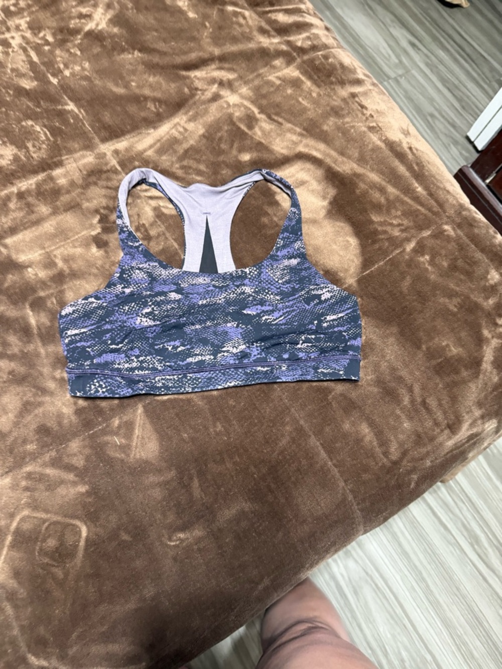 Woman’s size 10 Lululemon purple and black sports bra